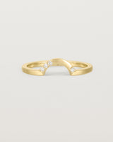 Fit two of a classic arc ring featuring scattered white diamonds, crafted in yellow gold