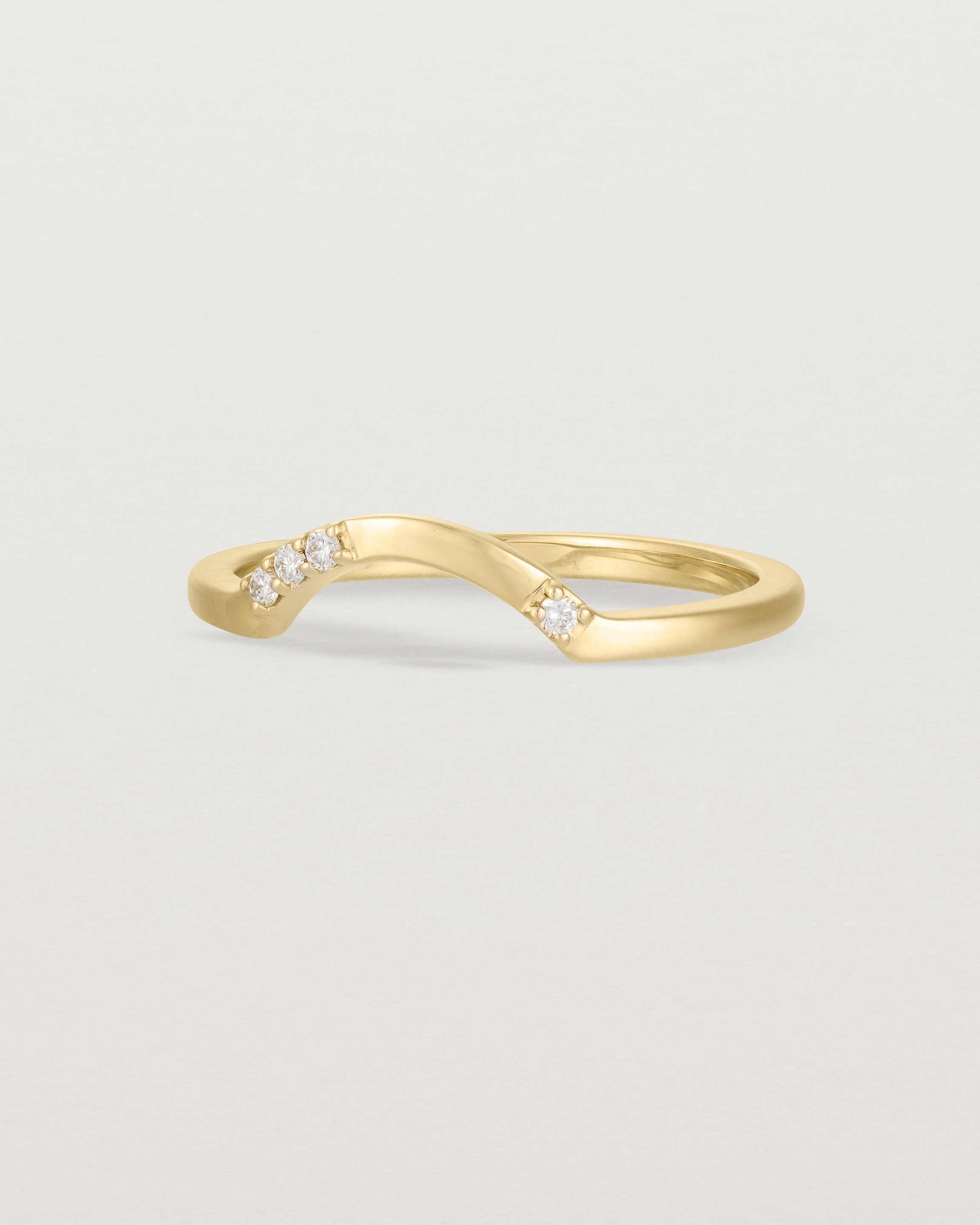 Fit three of a classic arc crown ring featuring scattered white diamonds, crafted in yellow gold