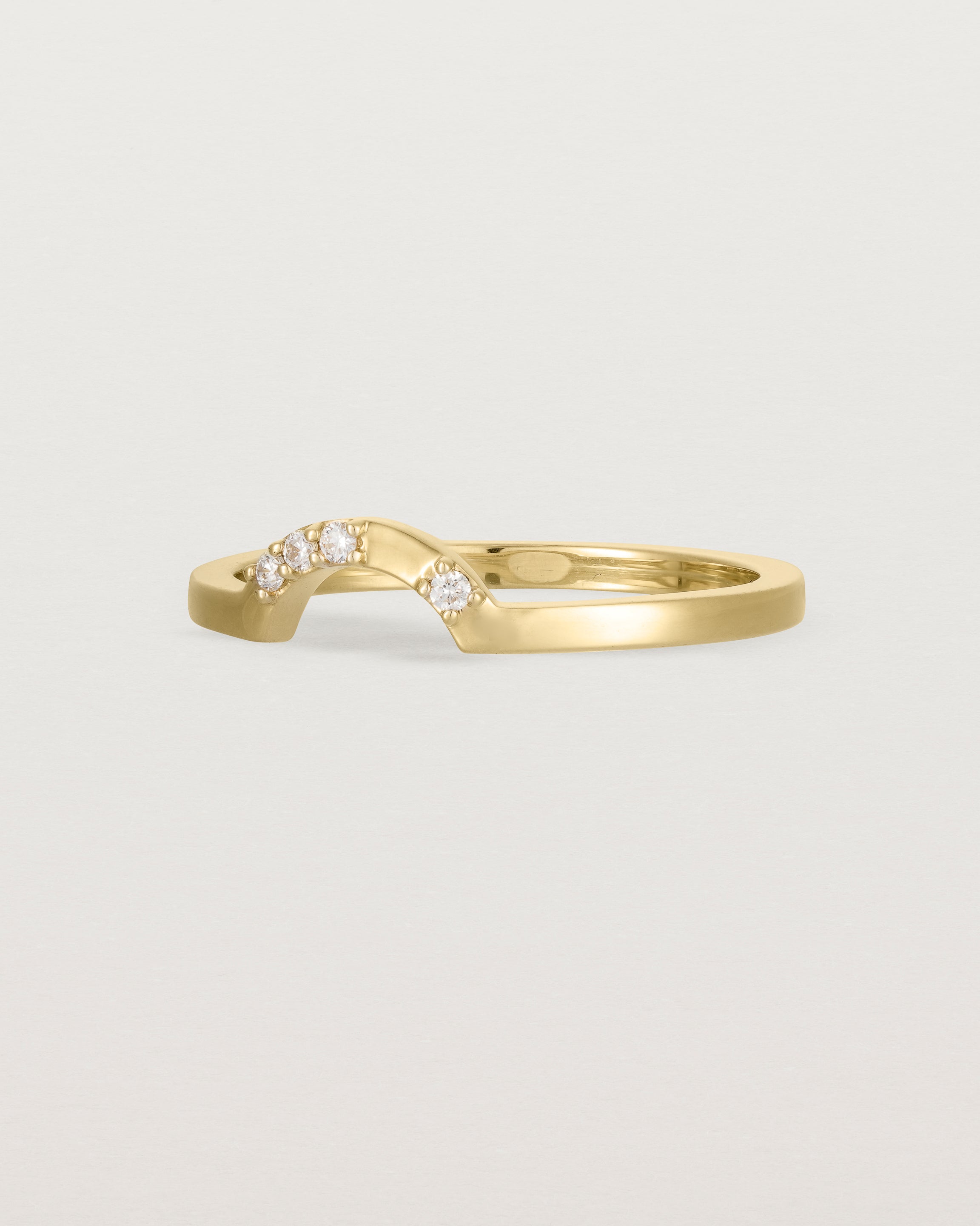 A classic small arc crown ring featuring scattered white diamonds, crafted in yellow gold