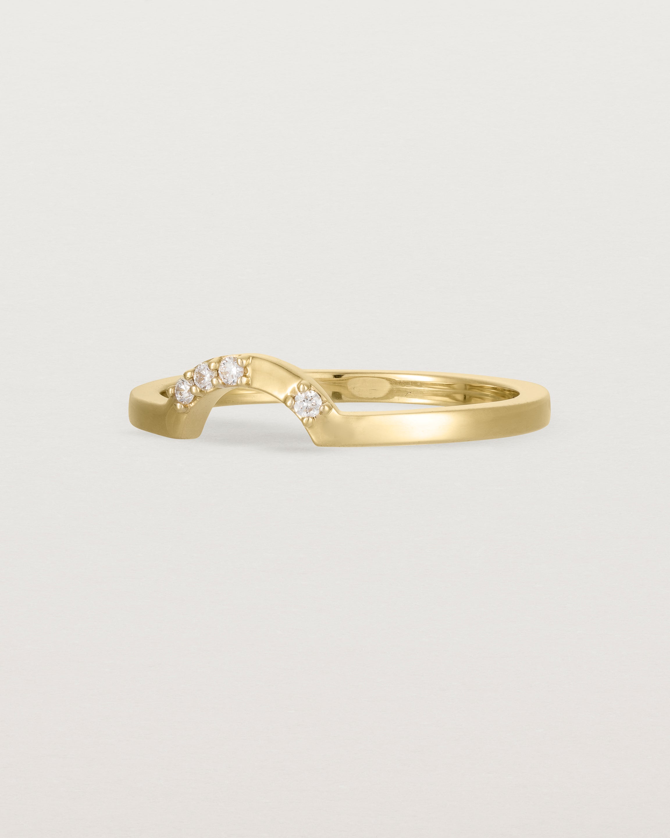 A classic small arc crown ring featuring scattered white diamonds, crafted in yellow gold