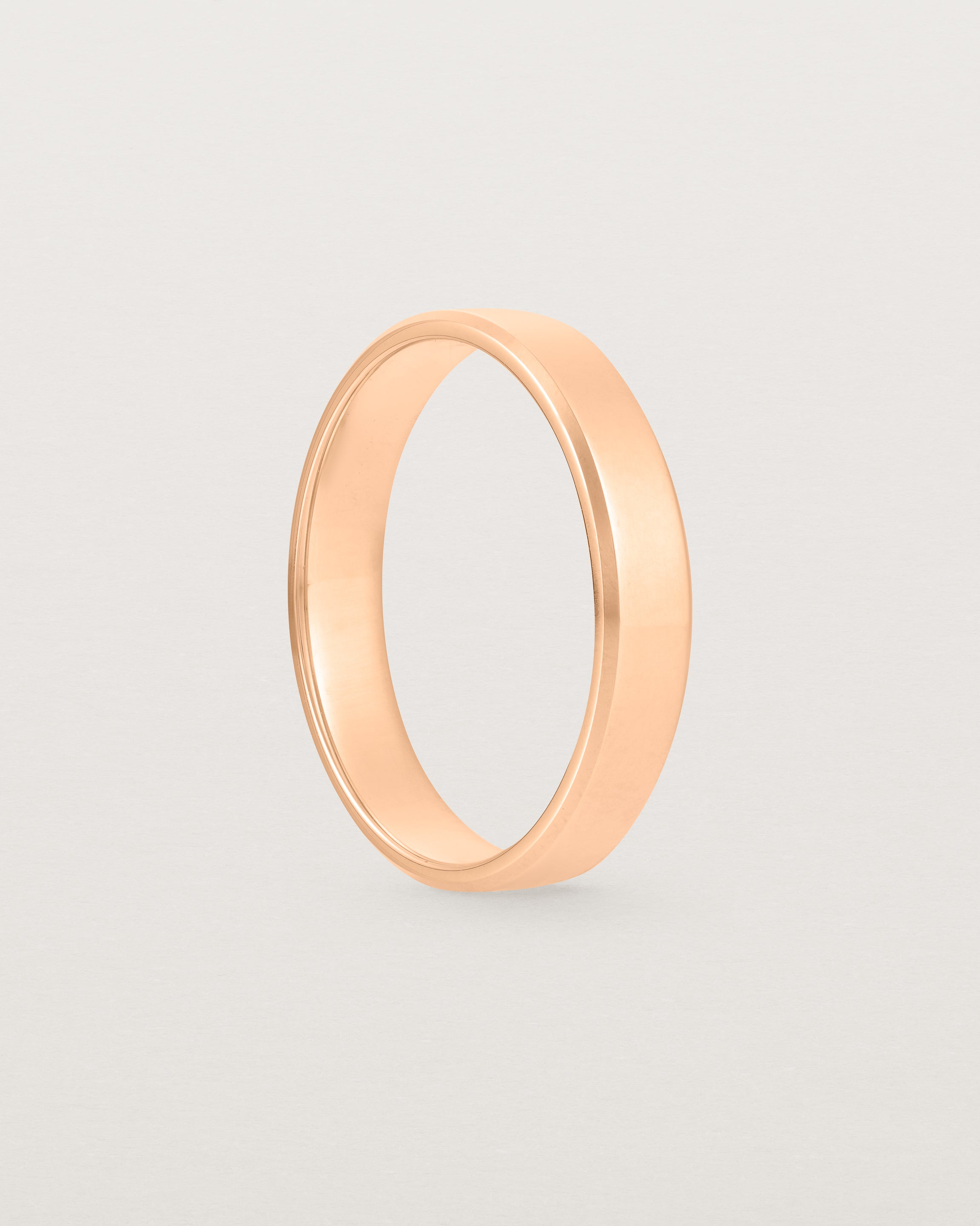 4mm rose gold wedding band with a chamfered edge