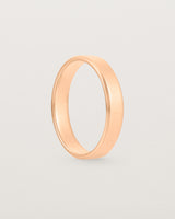 4mm rose gold wedding band with a chamfered edge