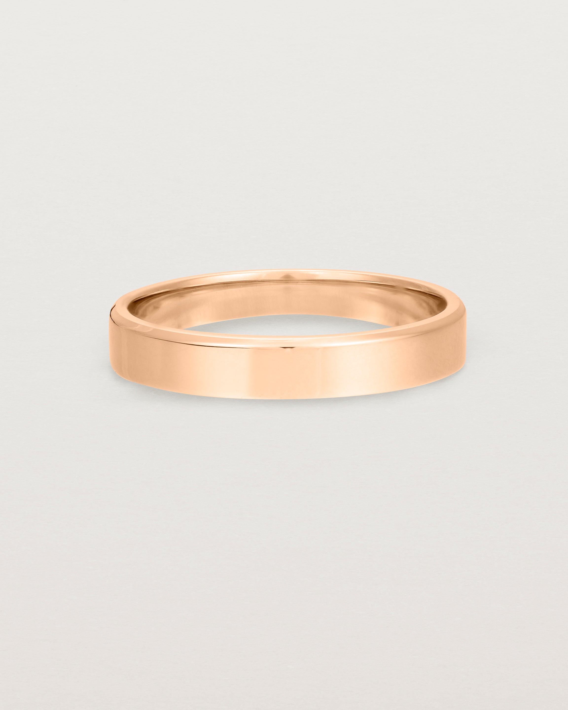 4mm rose gold wedding band with a chamfered edge
