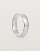 The front view of a 5mm wide heavy wedding ring in sterling silver 