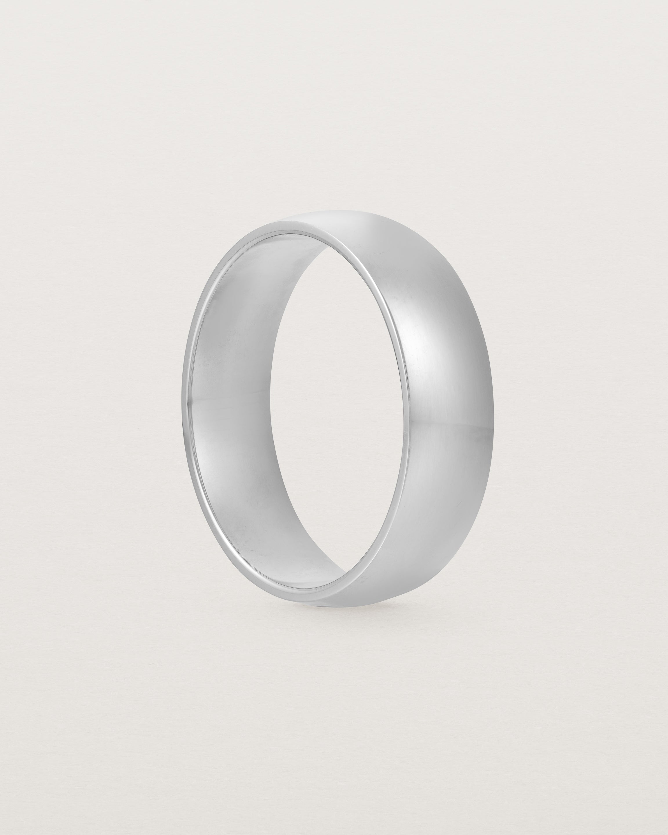 The front view of a heavy 6mm wedding band in sterling silver.