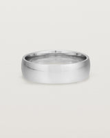 The front view of a 6mm wide heavy wedding ring in sterling silver
