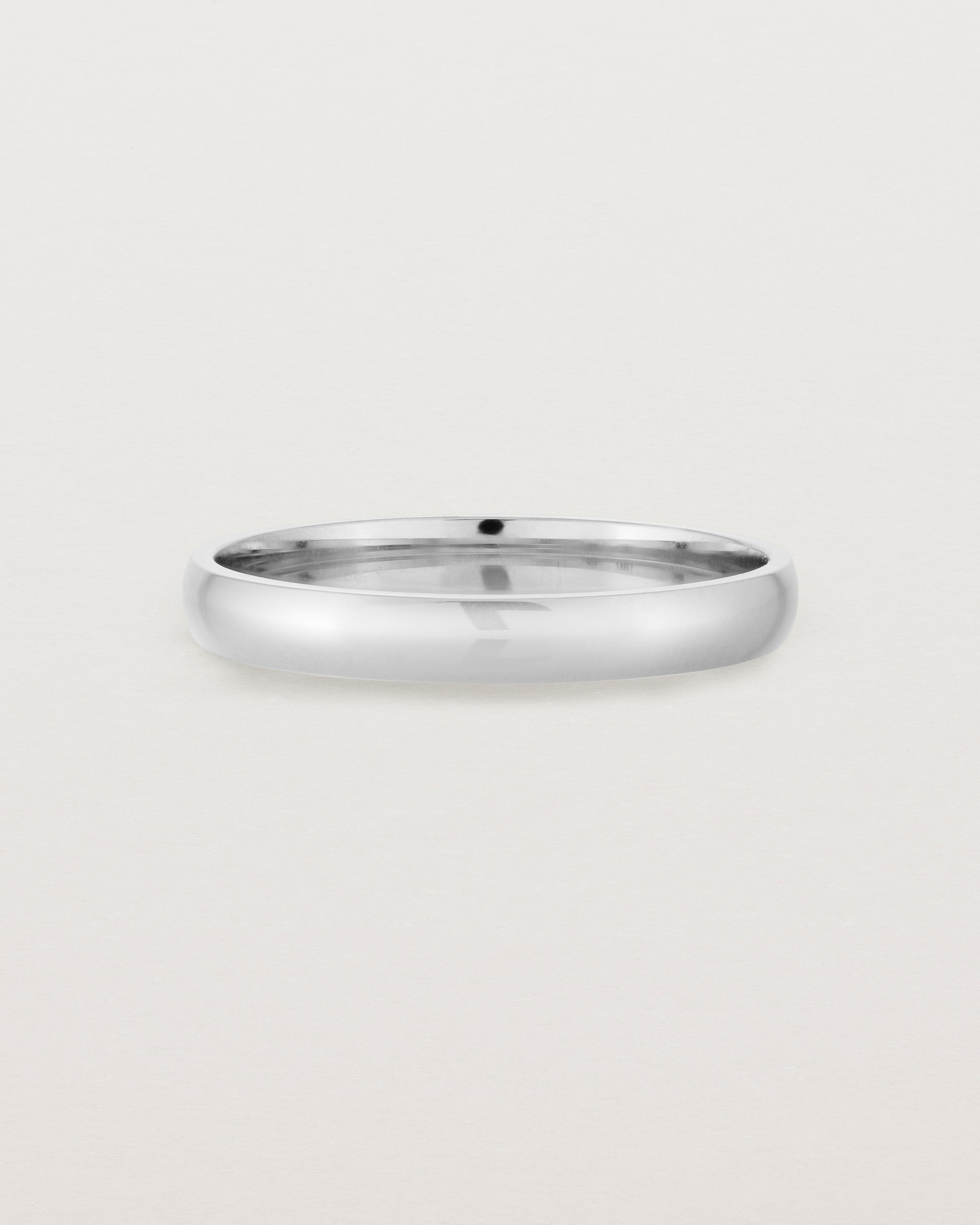 A 3mm fine, classic wedding band in sterling silver