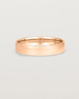 A classic 4mm wedding band crafted in rose gold