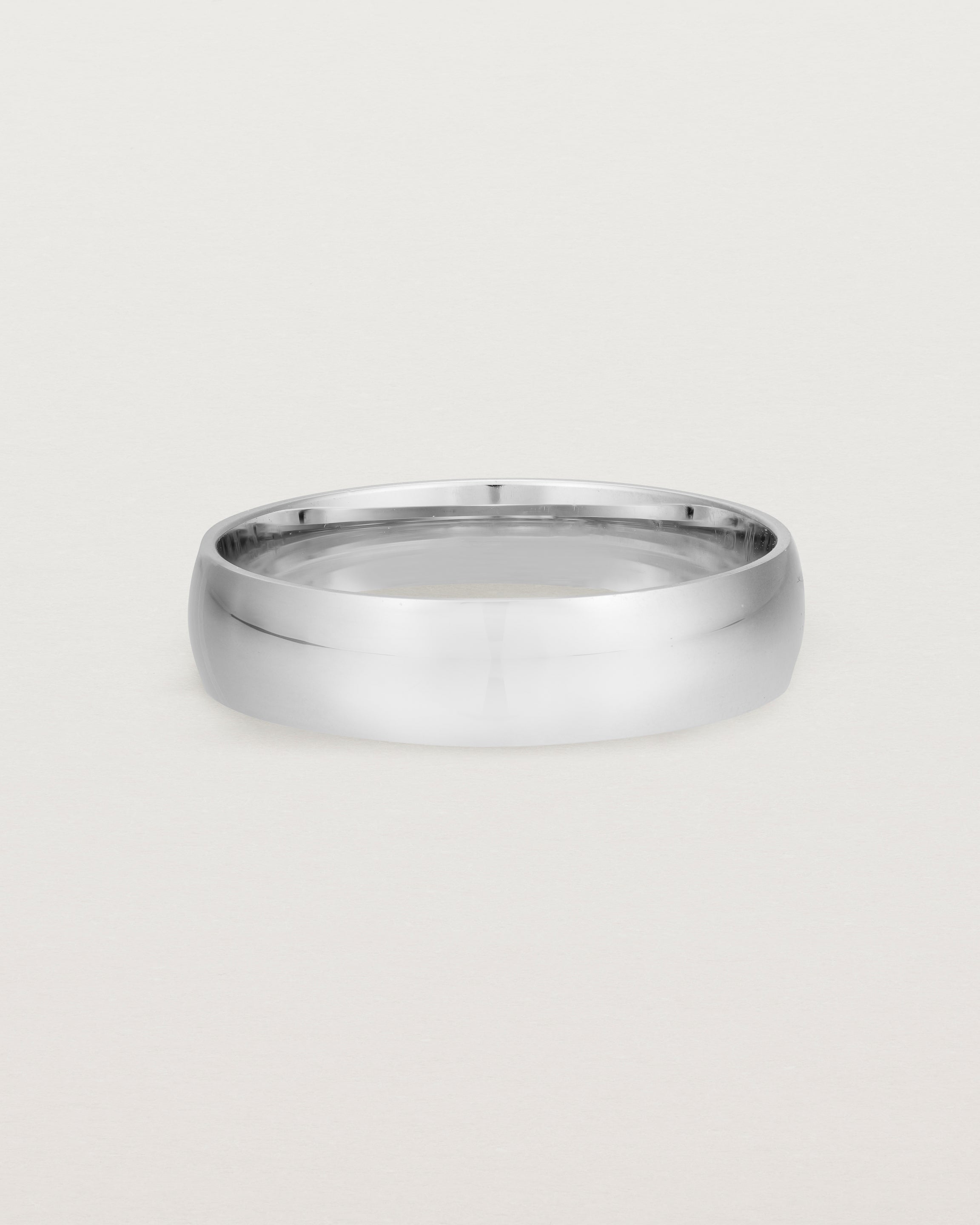 A classic 5mm wedding band, our most popular width, crafted in sterling silver