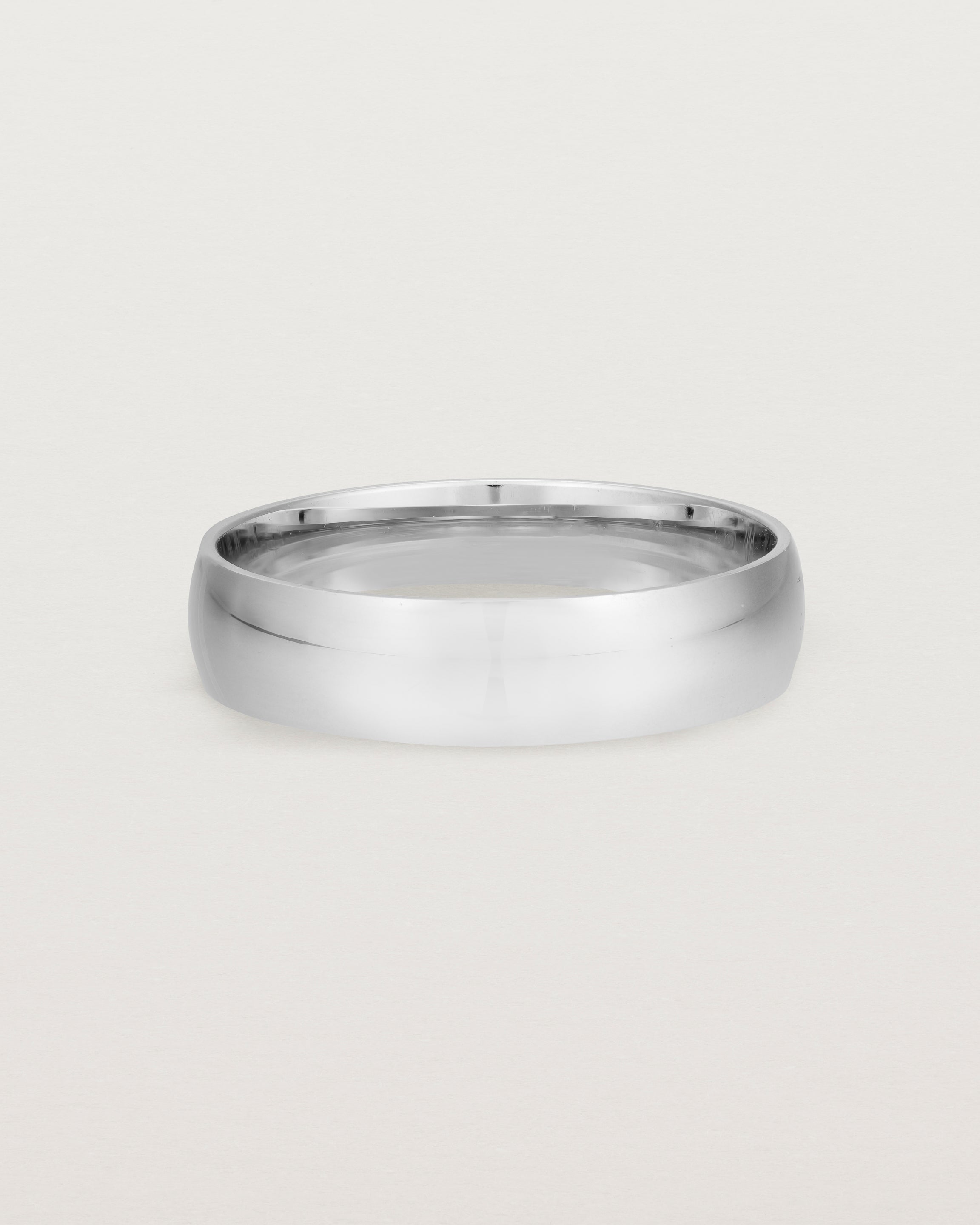 A classic 5mm wedding band, our most popular width, crafted in white gold