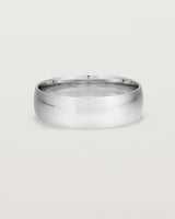 A bold 6mm wedding band crafted in white gold