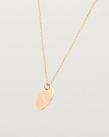 rose gold engraved necklace with a botanical vine engraving