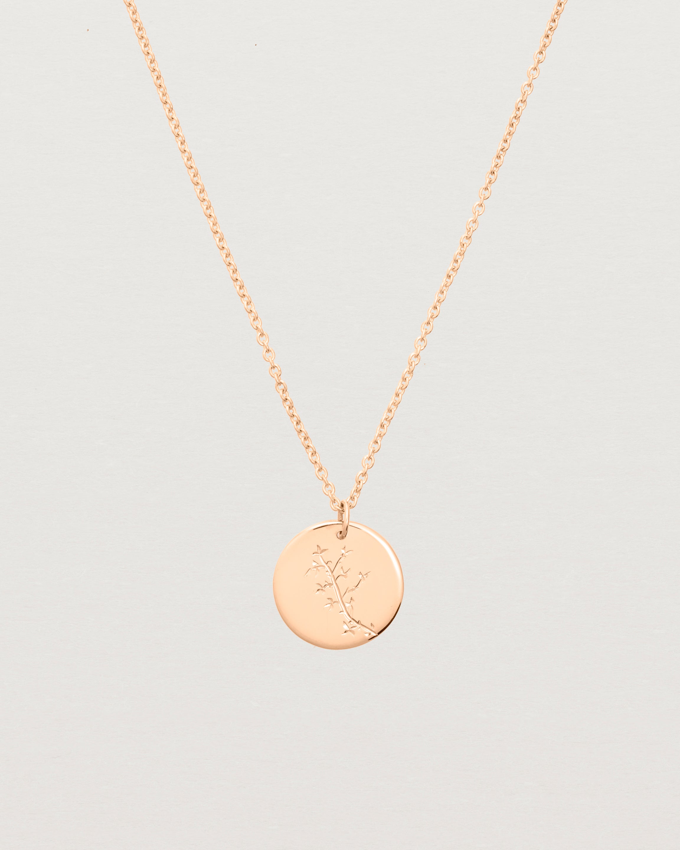 rose gold engraved necklace with a botanical vine engraving