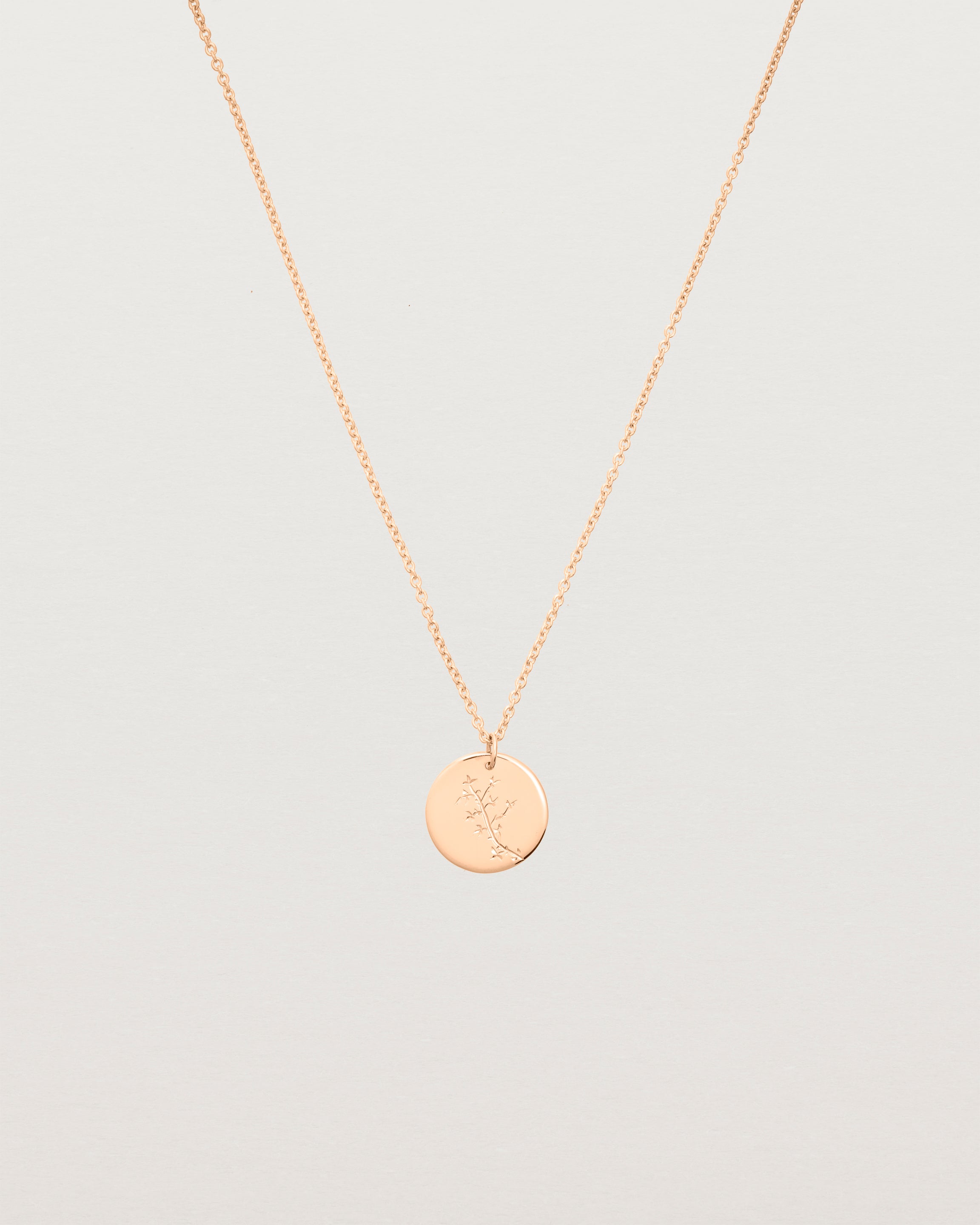 rose gold engraved necklace with a botanical vine engraving