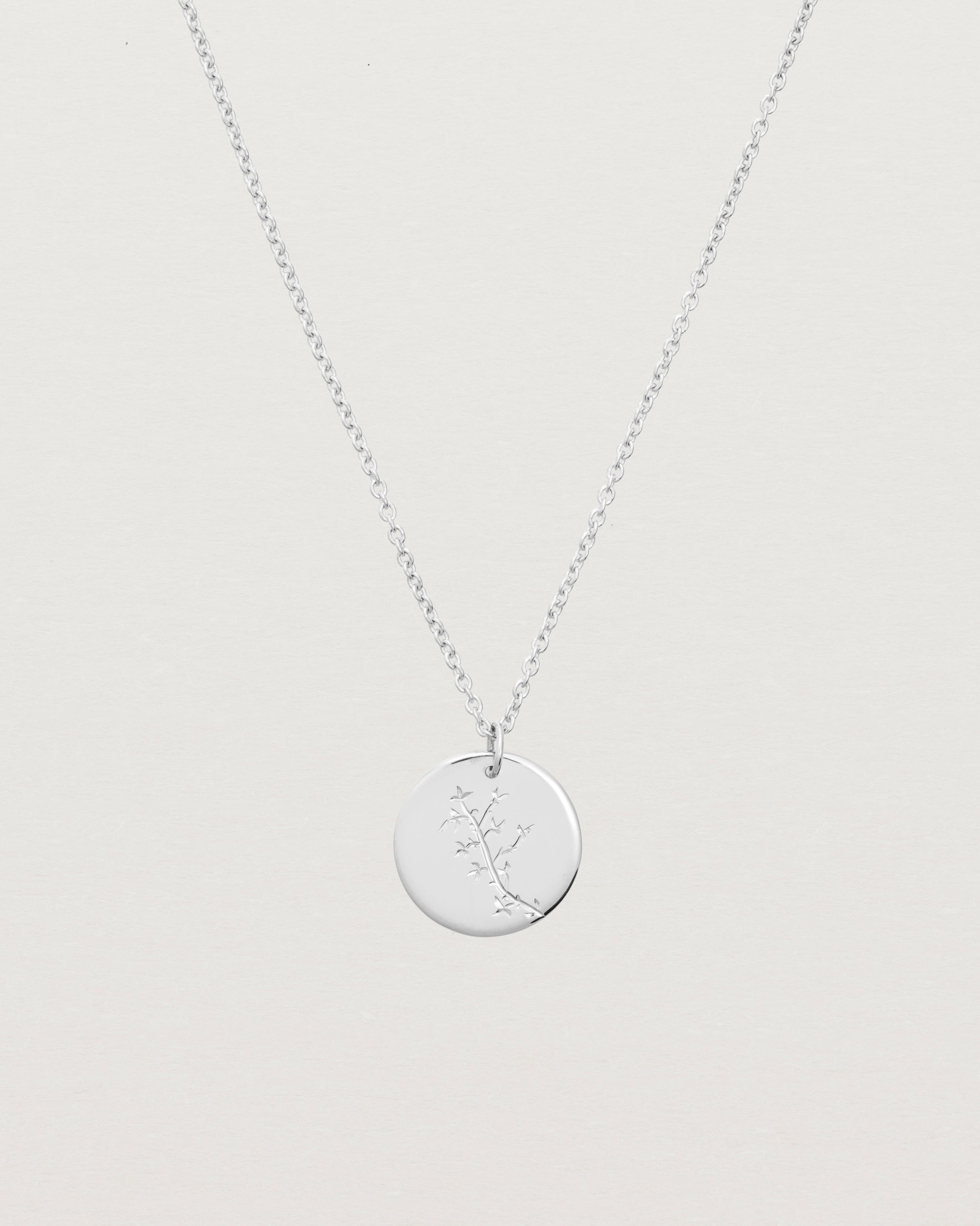 sterling silver engraved necklace with a botanical vine engraving