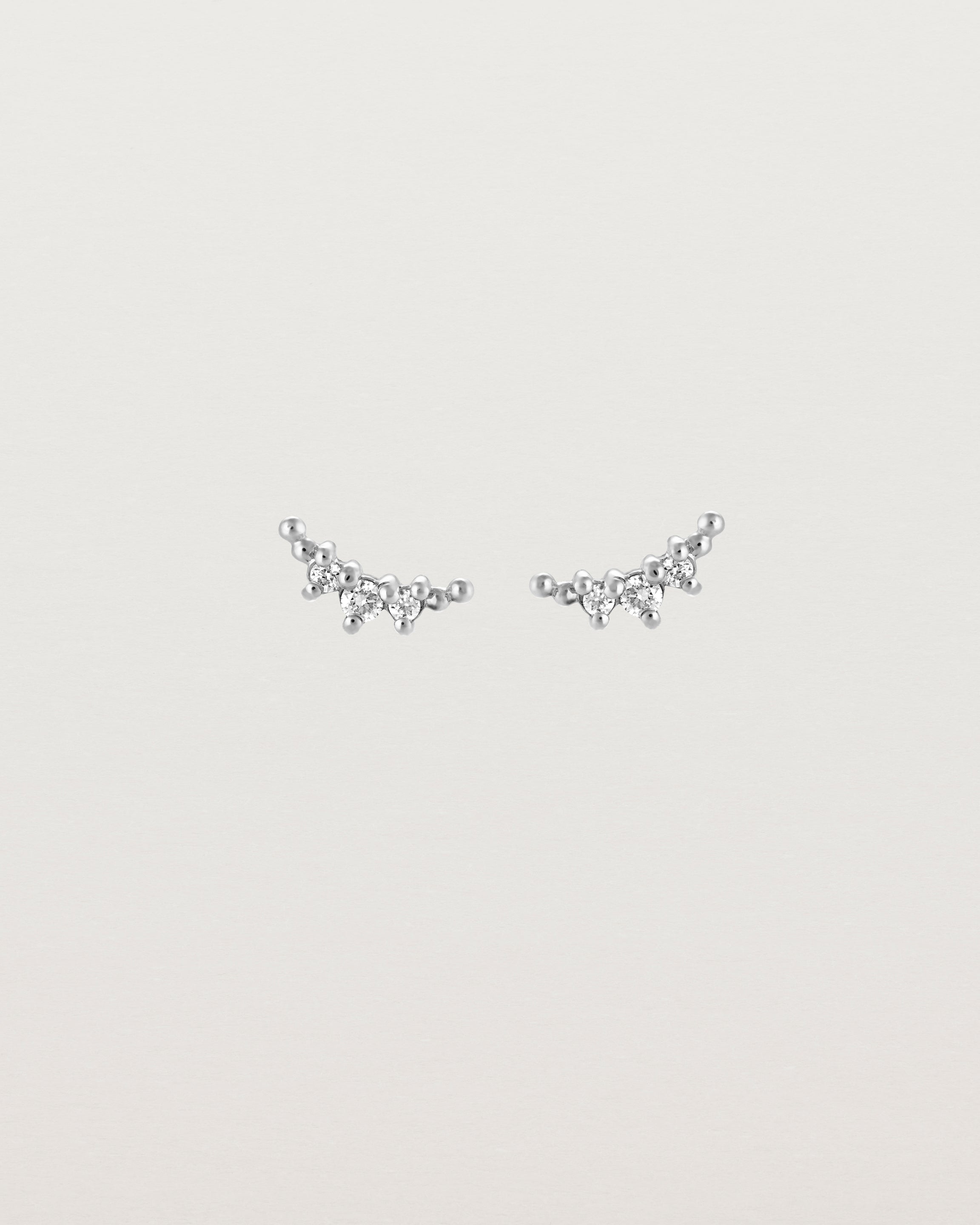 Front view of the Crescent Studs | Diamonds in white gold.