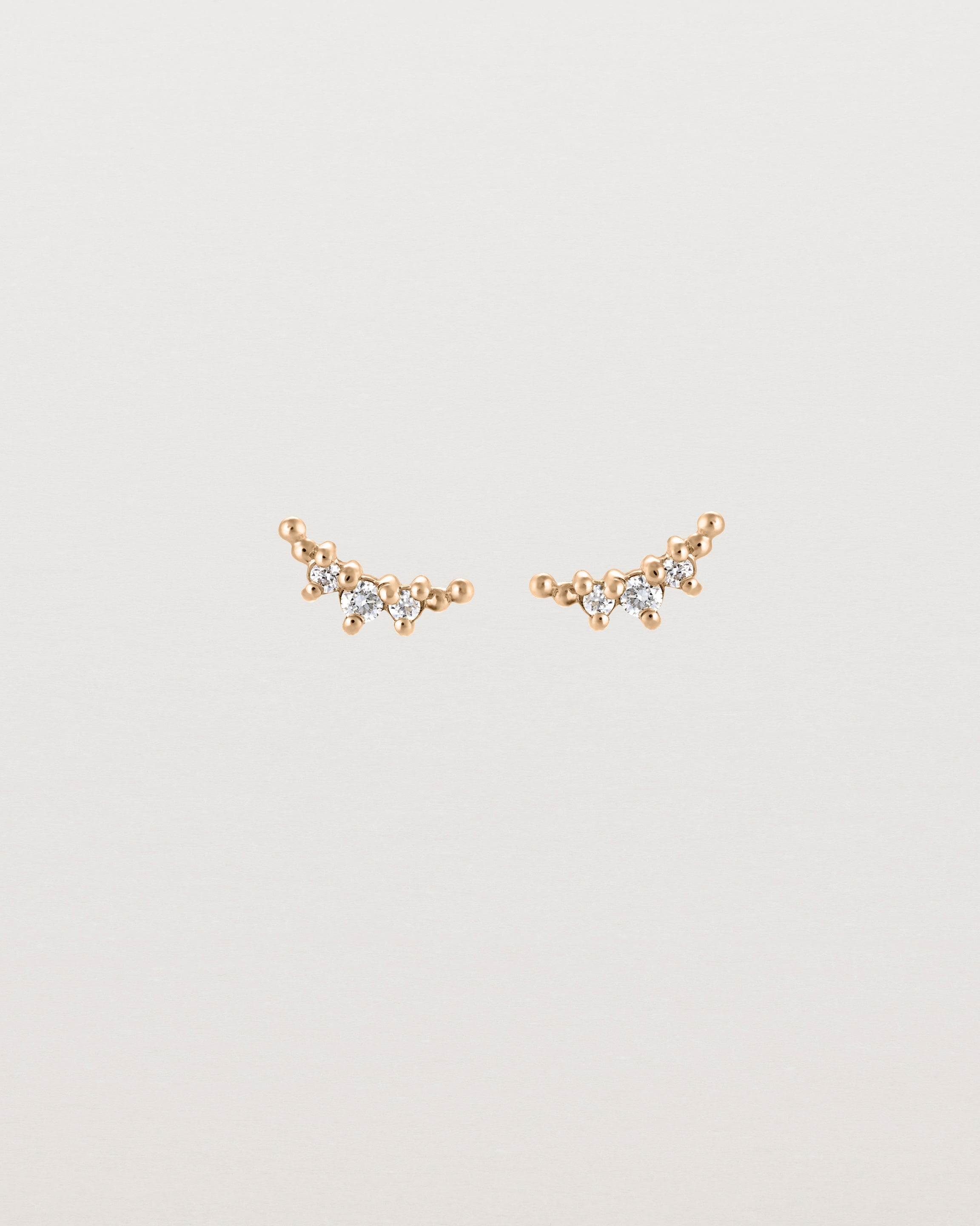 Front view of the Crescent Studs | Diamonds in rose gold.