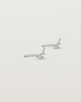 Angled view of the Crescent Studs | Diamonds in white gold.