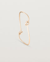 Standing view of the Dà anam Bangle in rose gold.