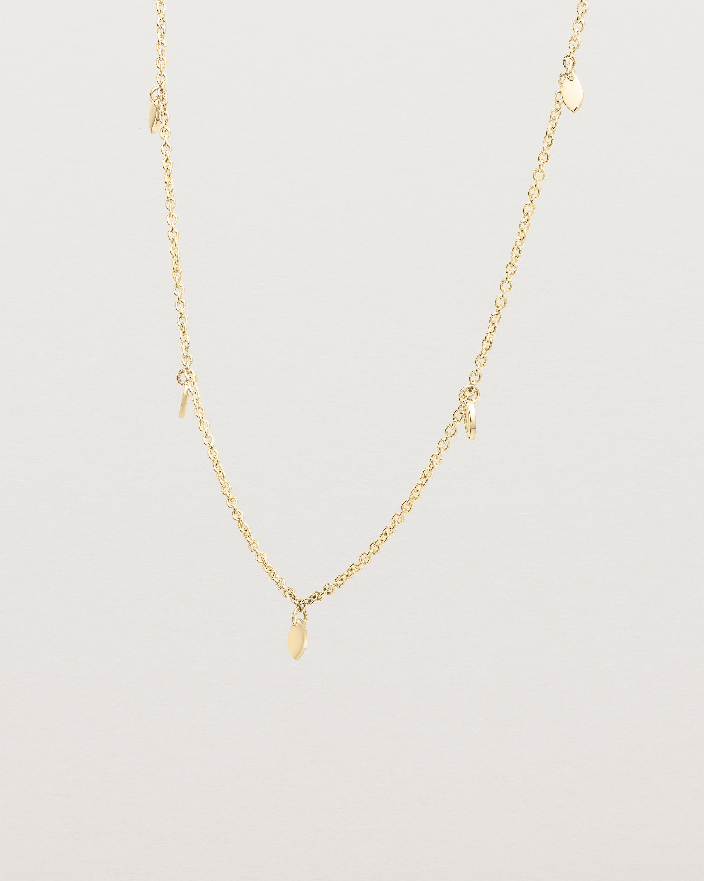Angled view of the Daisy Chain Necklace | Yellow Gold.