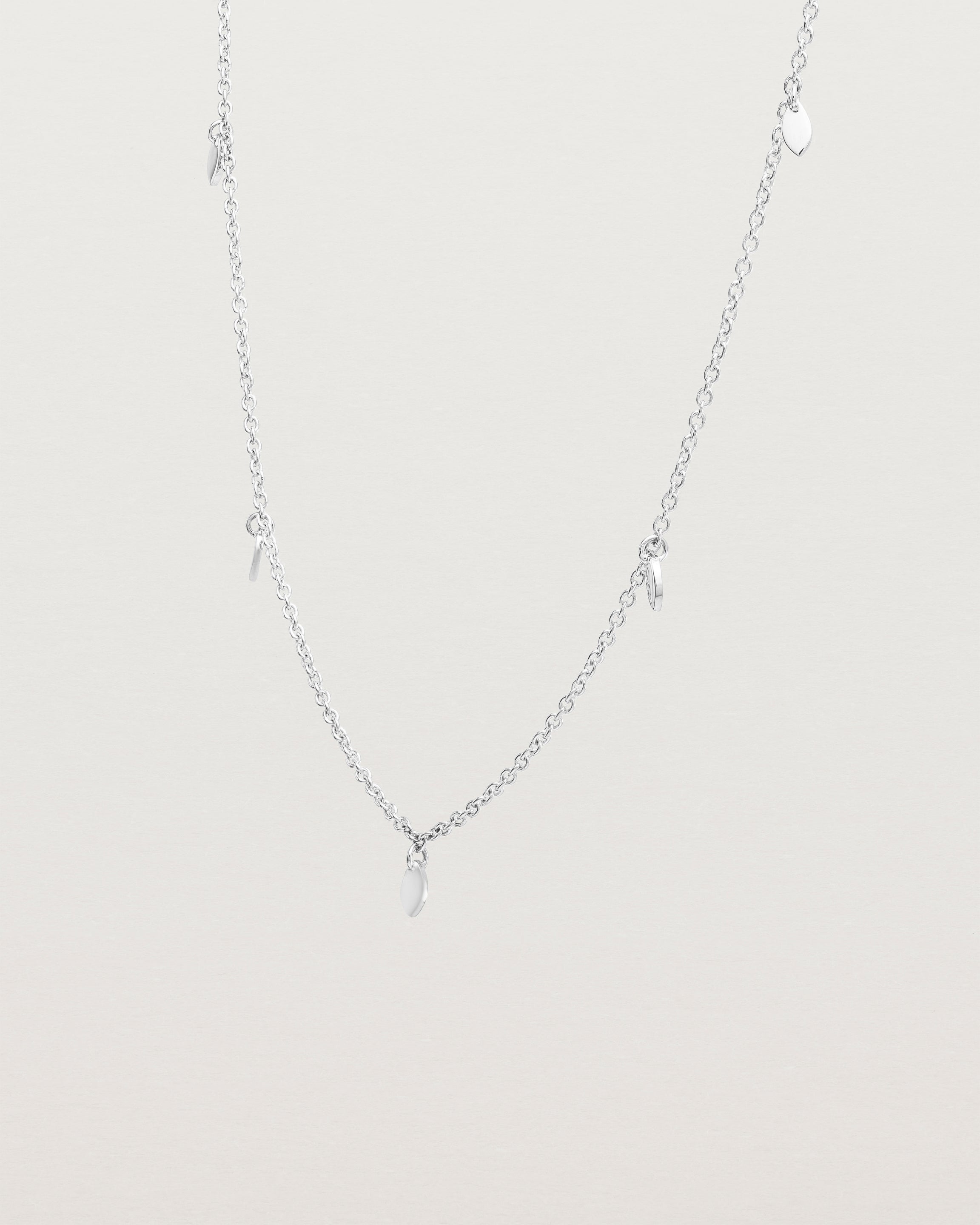 Angled view of the Daisy Chain Necklace | Sterling Silver.
