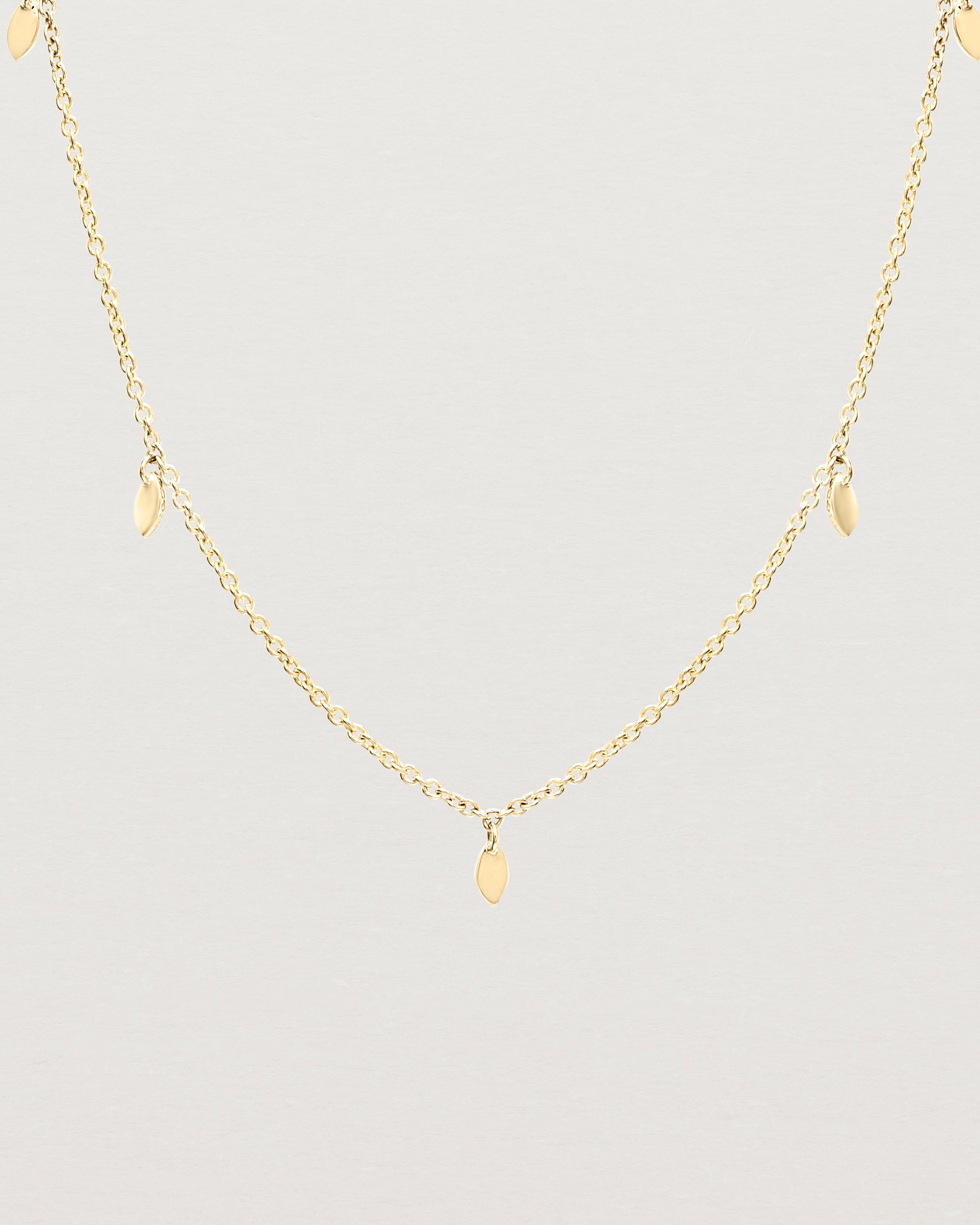 Close up view of the Daisy Chain Necklace | Yellow Gold.