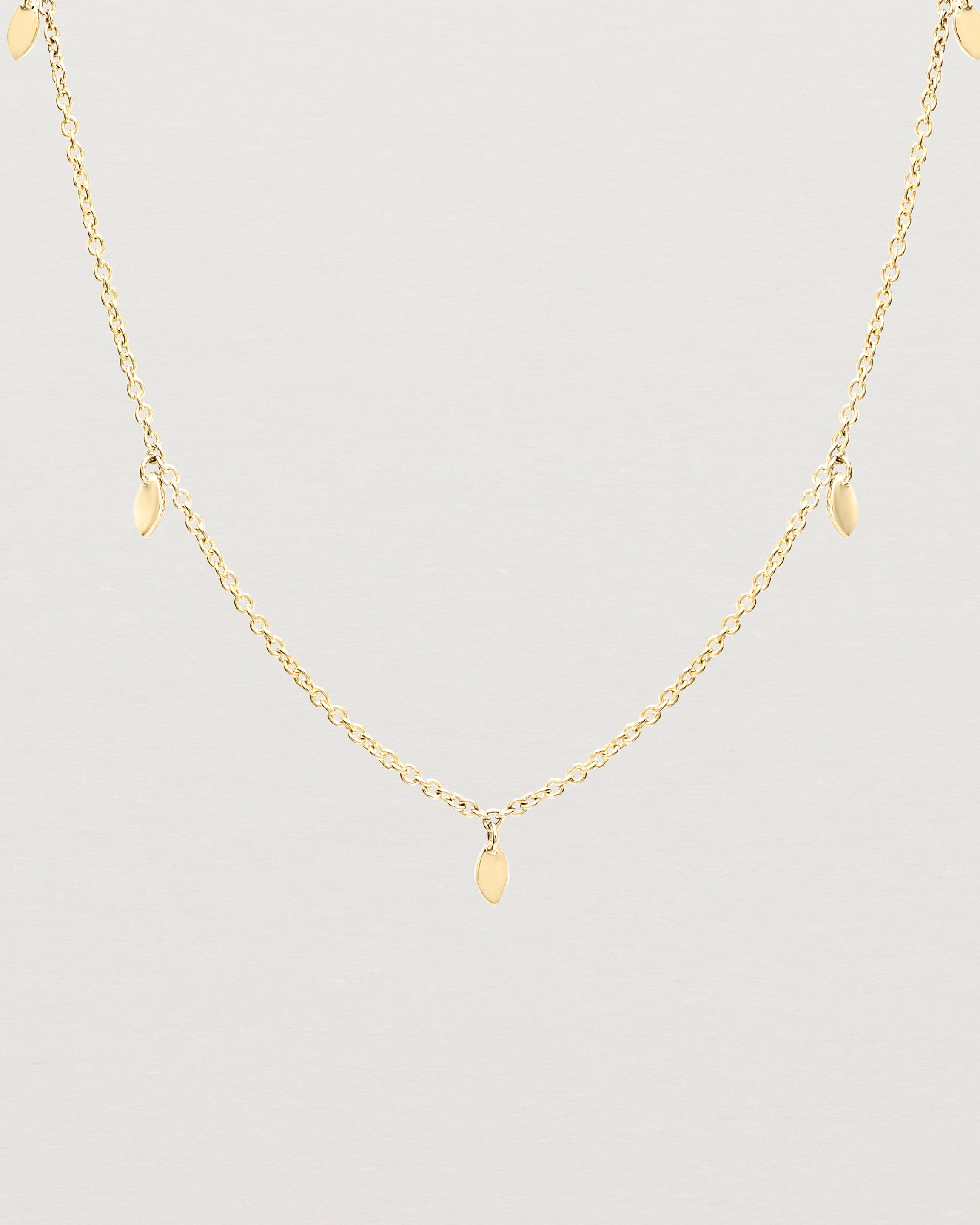 Close up view of the Daisy Chain Necklace | Yellow Gold.