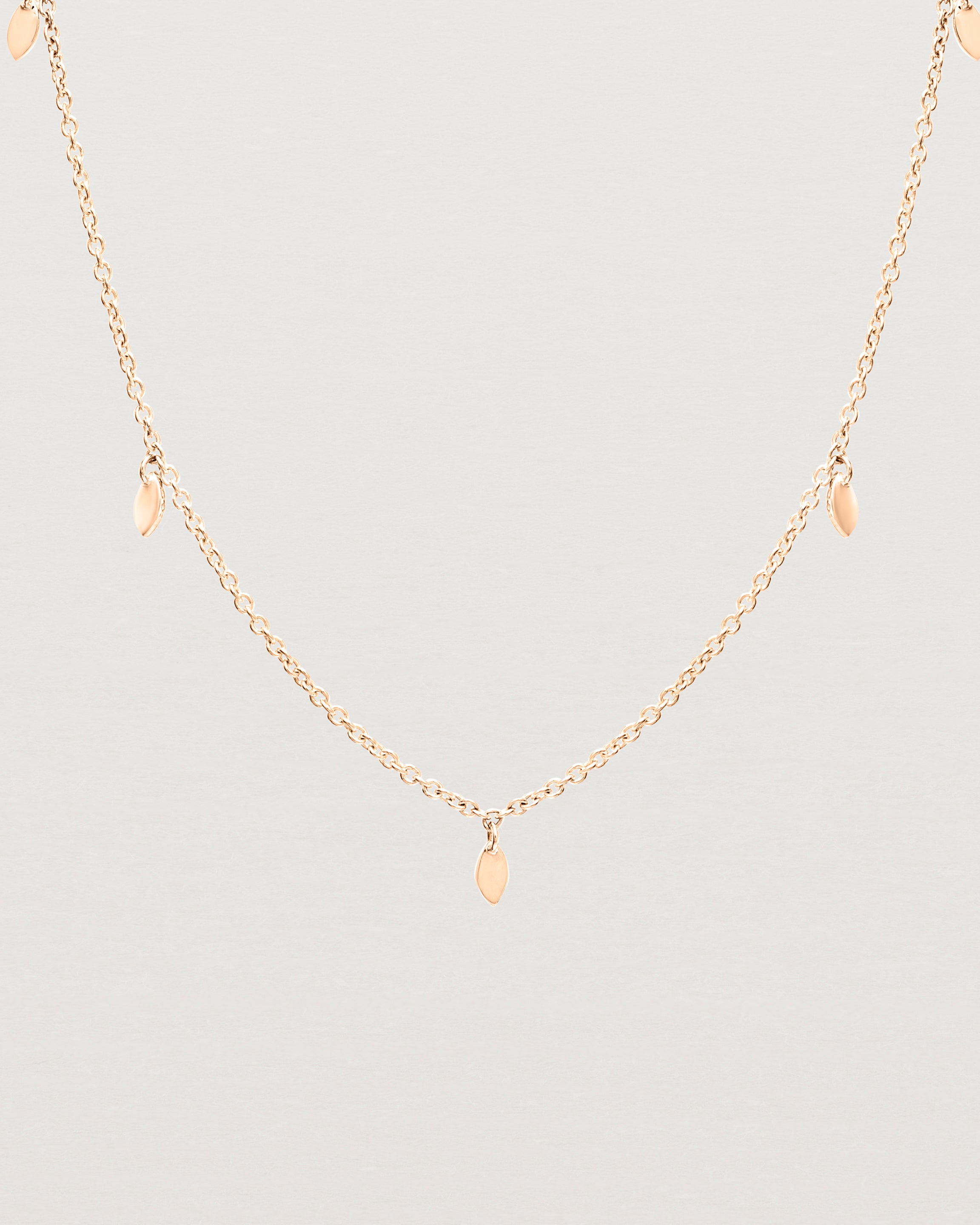 Close up view of the Daisy Chain Necklace | Rose Gold.