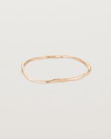 Front view of the Dalí Bangle in rose gold