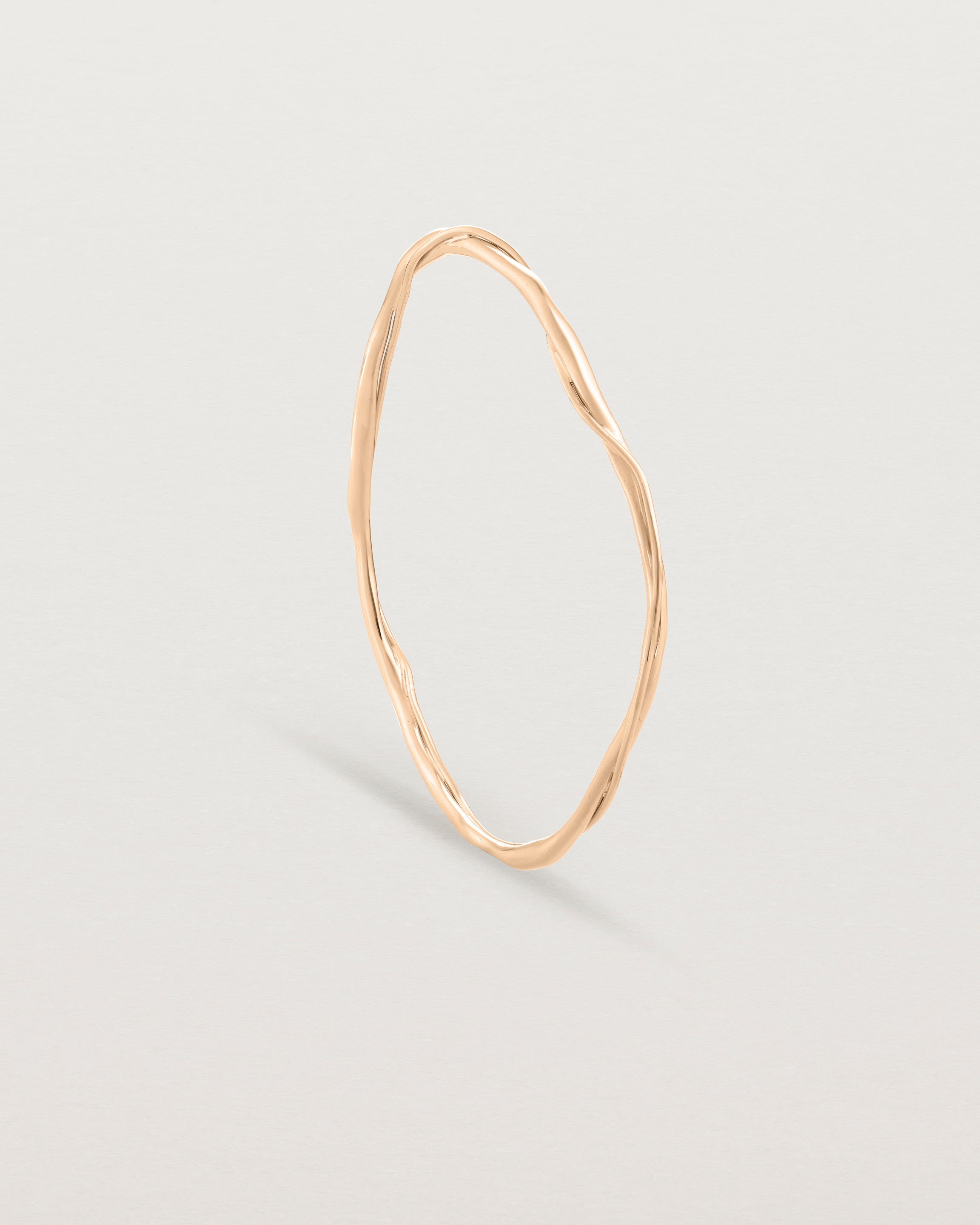Standing view of the Dalí Bangle in rose gold