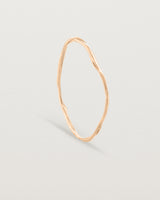 Standing view of the Dalí Bangle in rose gold