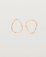 Front view of the Dalí Earrings in rose gold.