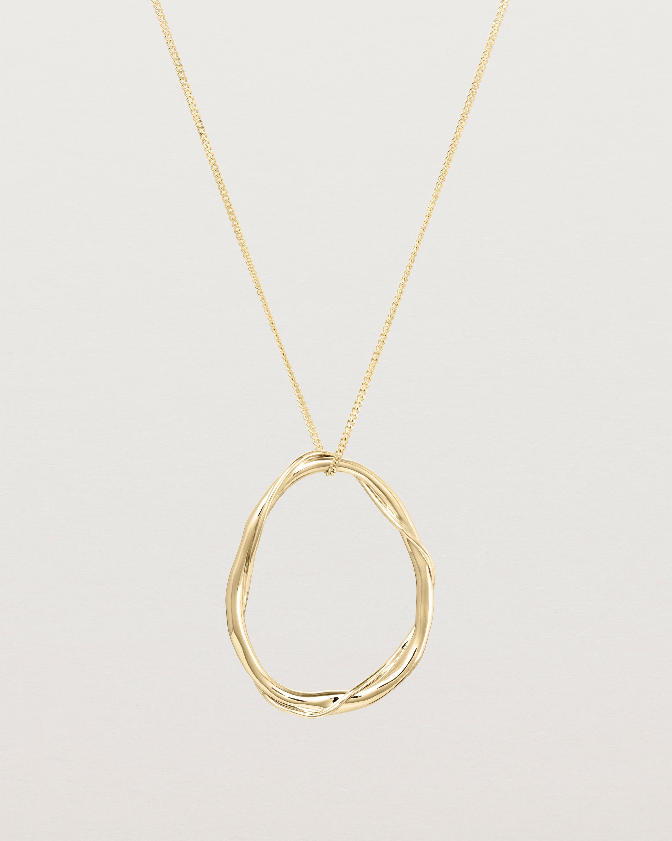 Front view of the Dalí Necklace in yellow gold.