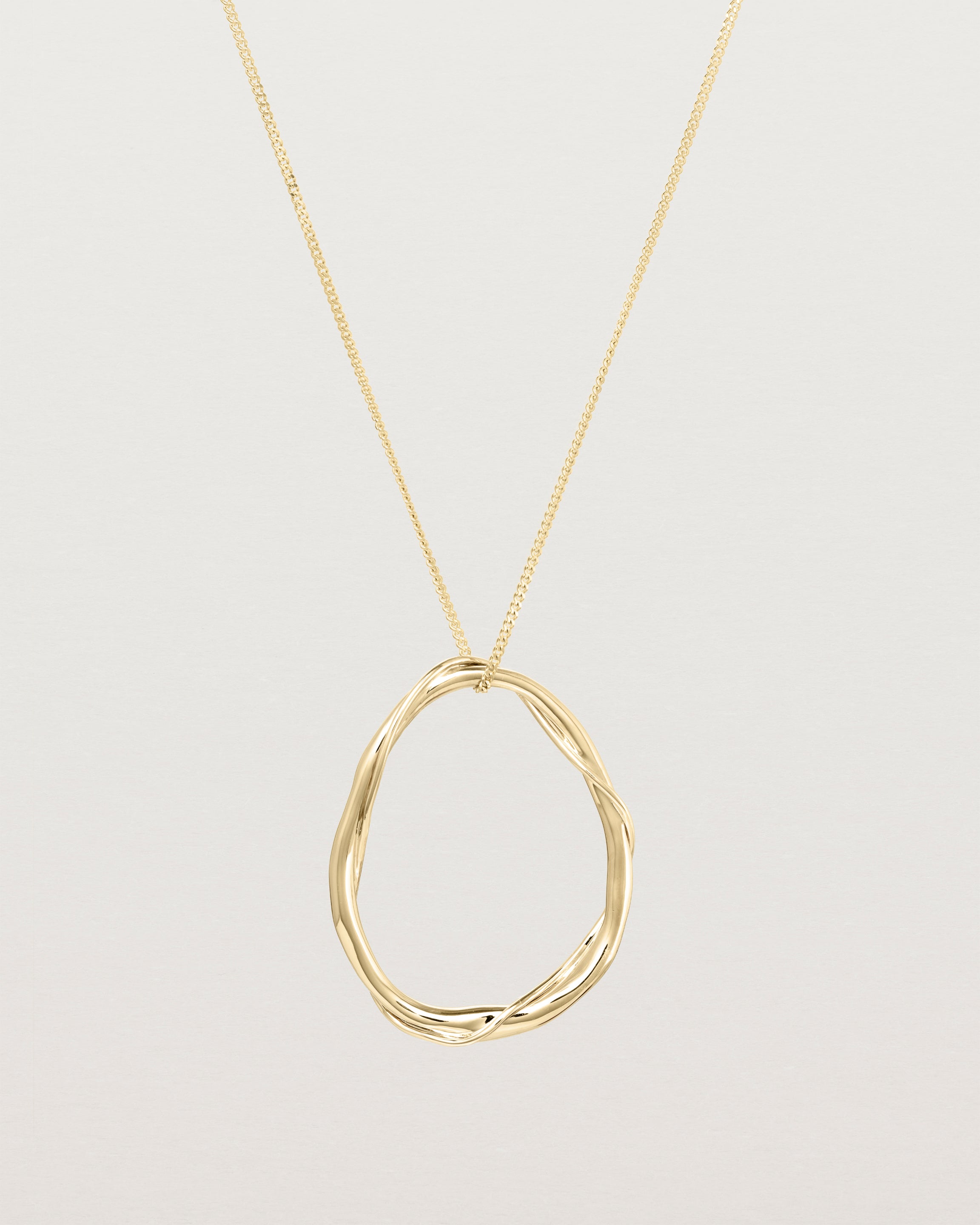 Front view of the Dalí Necklace in yellow gold.