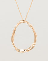 Close up view of the Dalí Necklace in rose gold.
