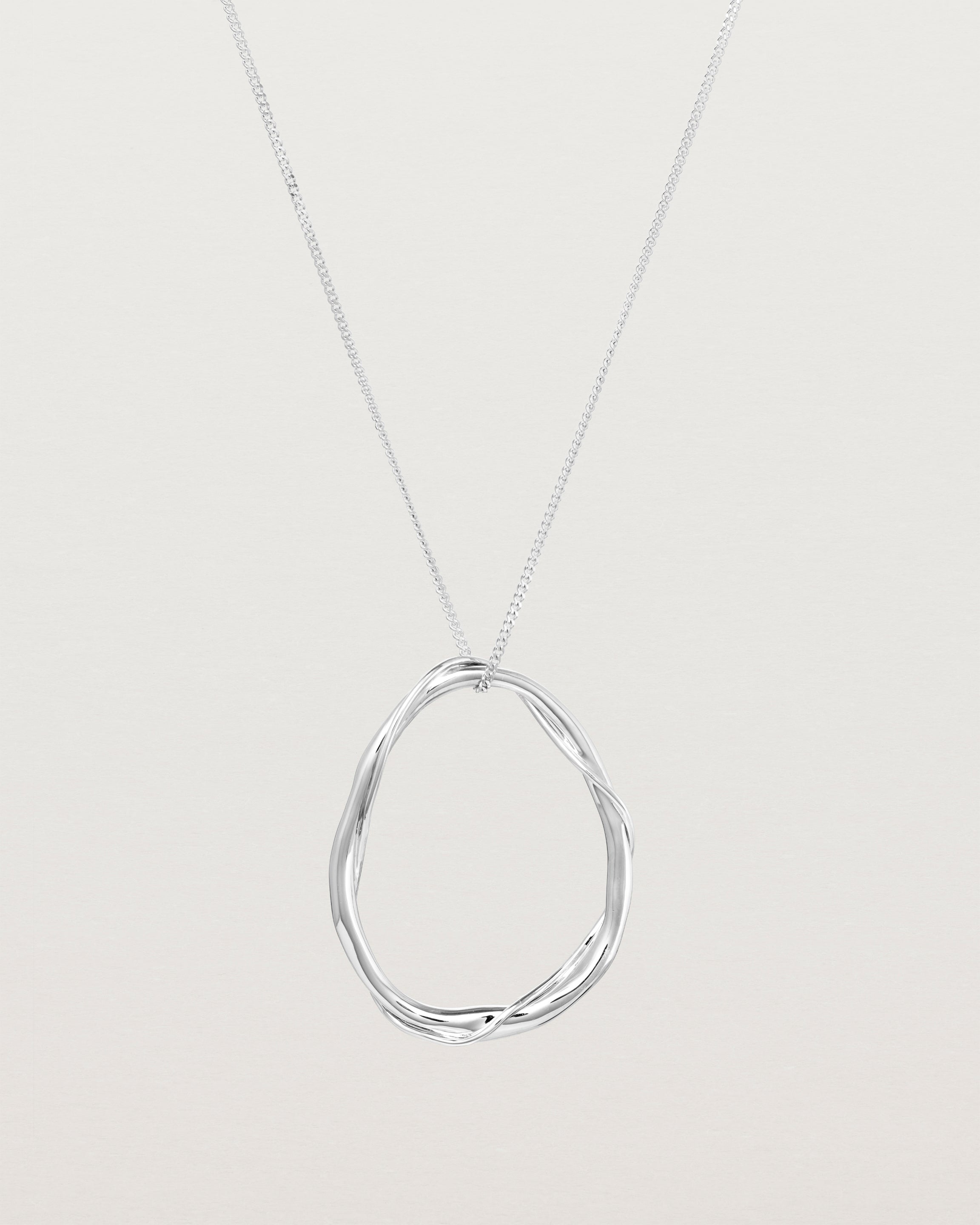 Front view of the Dalí Necklace in sterling silver.