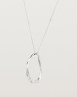 Angled view of the Dalí Necklace in sterling silver.