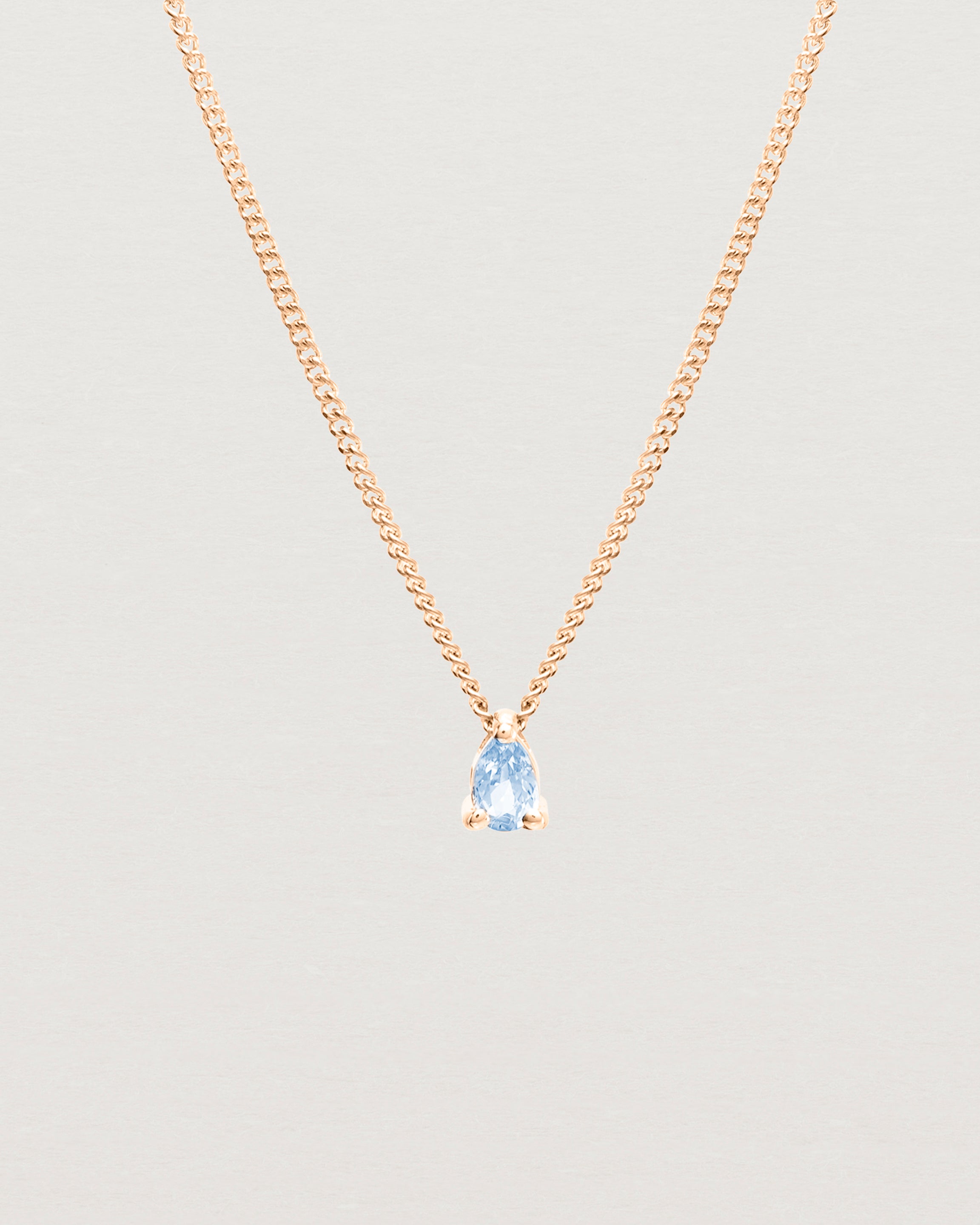 Front view of the Danaë Slider Pendant | Sapphire | Rose Gold.