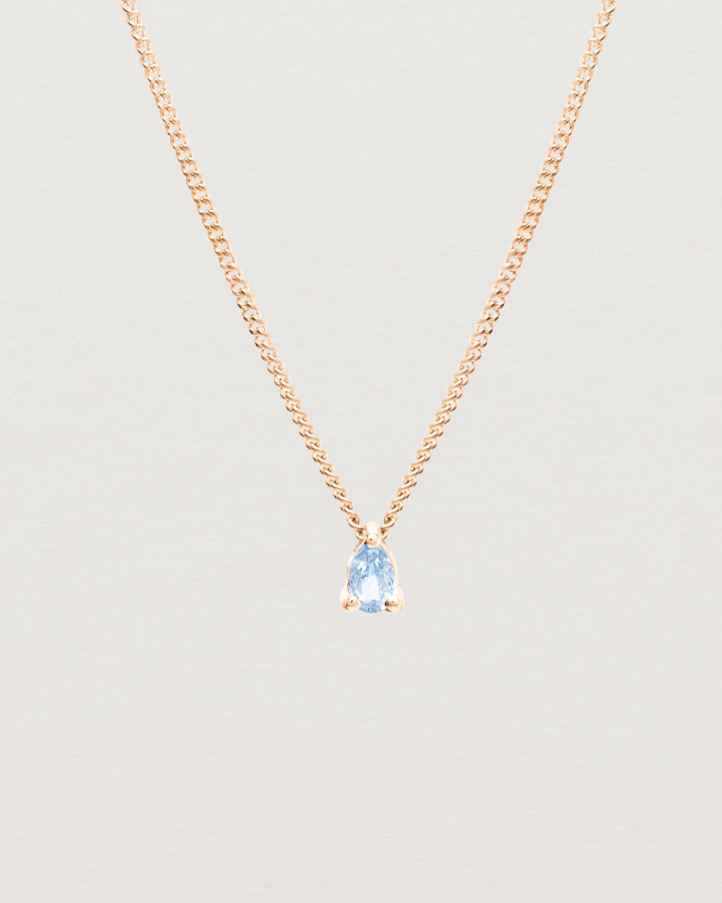 Front view of the Danaë Slider Pendant | Sapphire | Rose Gold.