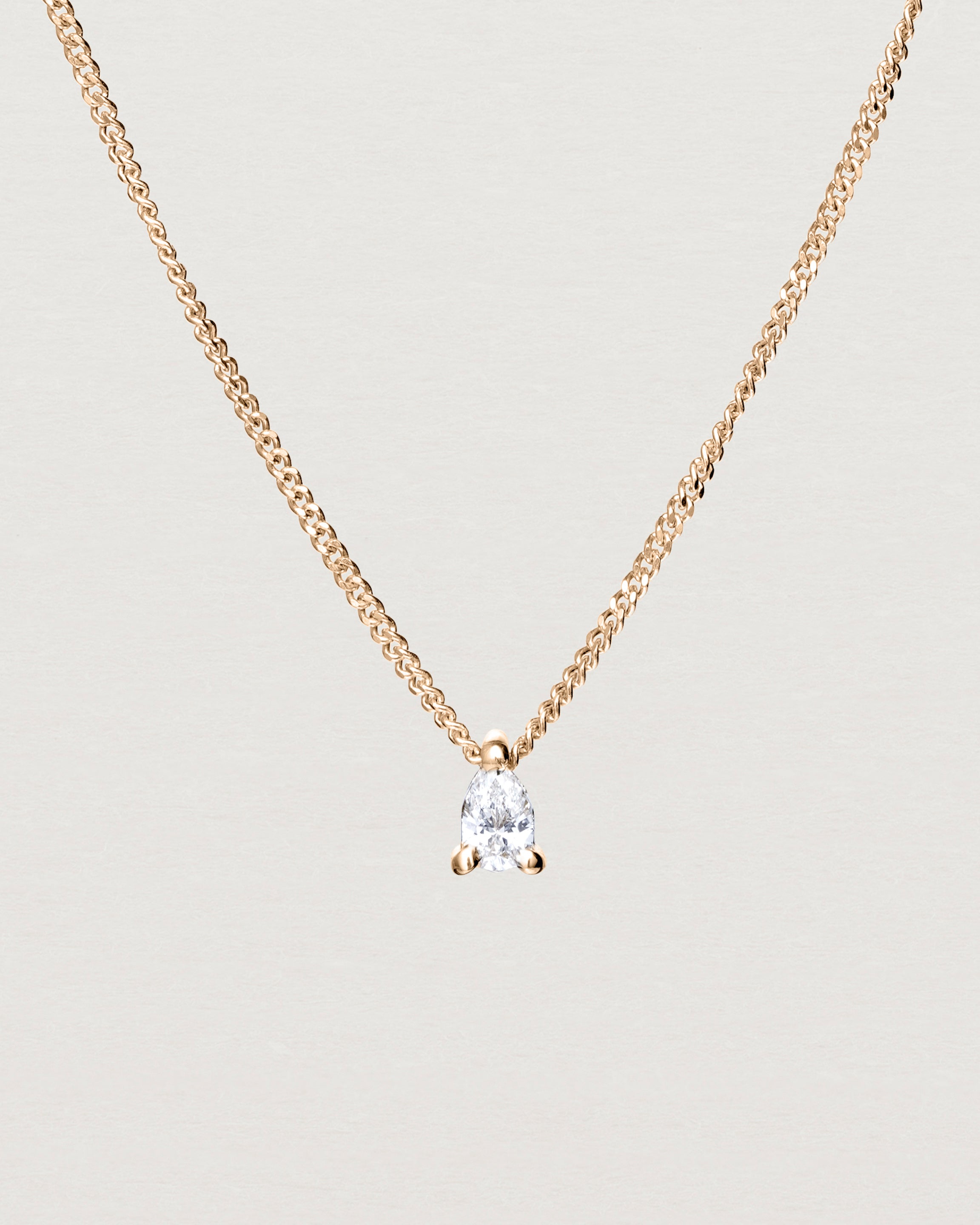 Close up view of the Danaë Slider Necklace | Diamond in rose gold.