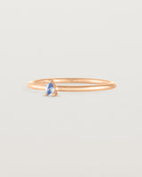 Angled view of the Danaë Stacking Ring | Sapphire in rose gold.