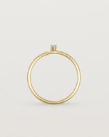 Standing view of the Danaë Stacking Ring | Sapphire in yellow gold.