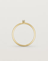 Standing view of the Danaë Stacking Ring | Sapphire in yellow gold.