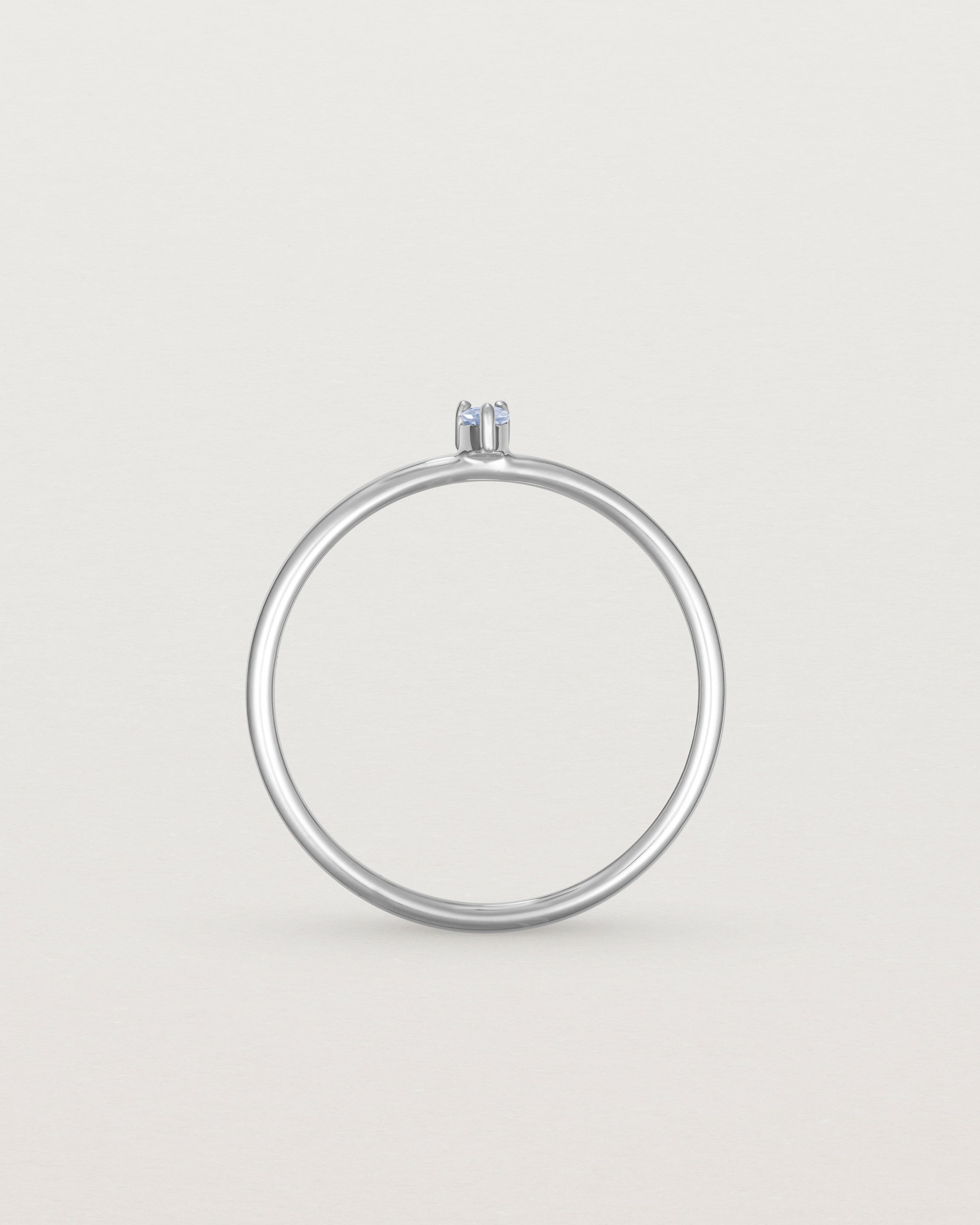 Standing view of the Danaë Stacking Ring | Sapphire in white gold.