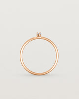 Standing view of the Danaë Stacking Ring | Sapphire in rose gold.