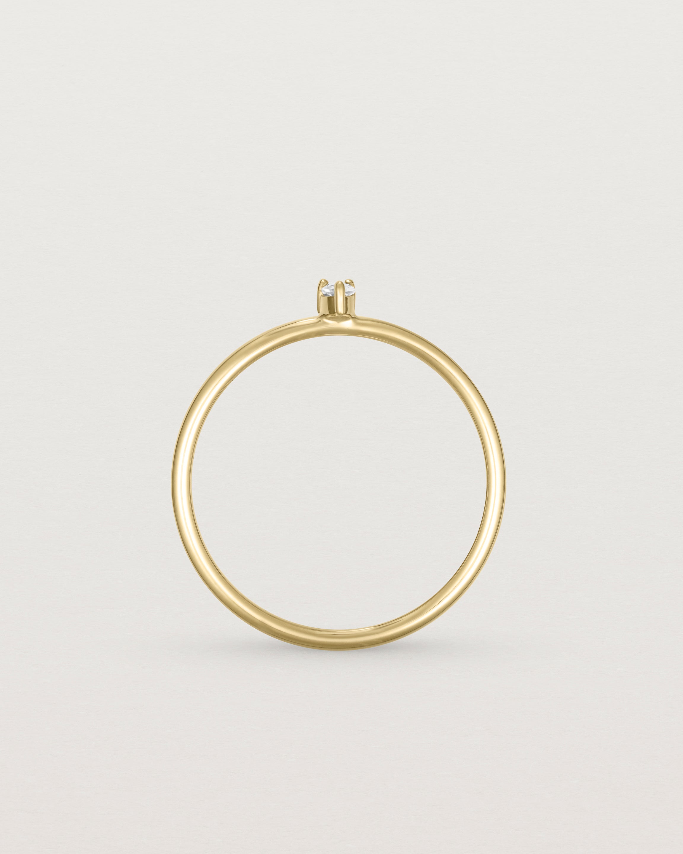 Standing view of the Danaë Stacking Ring | Diamond in yellow gold.