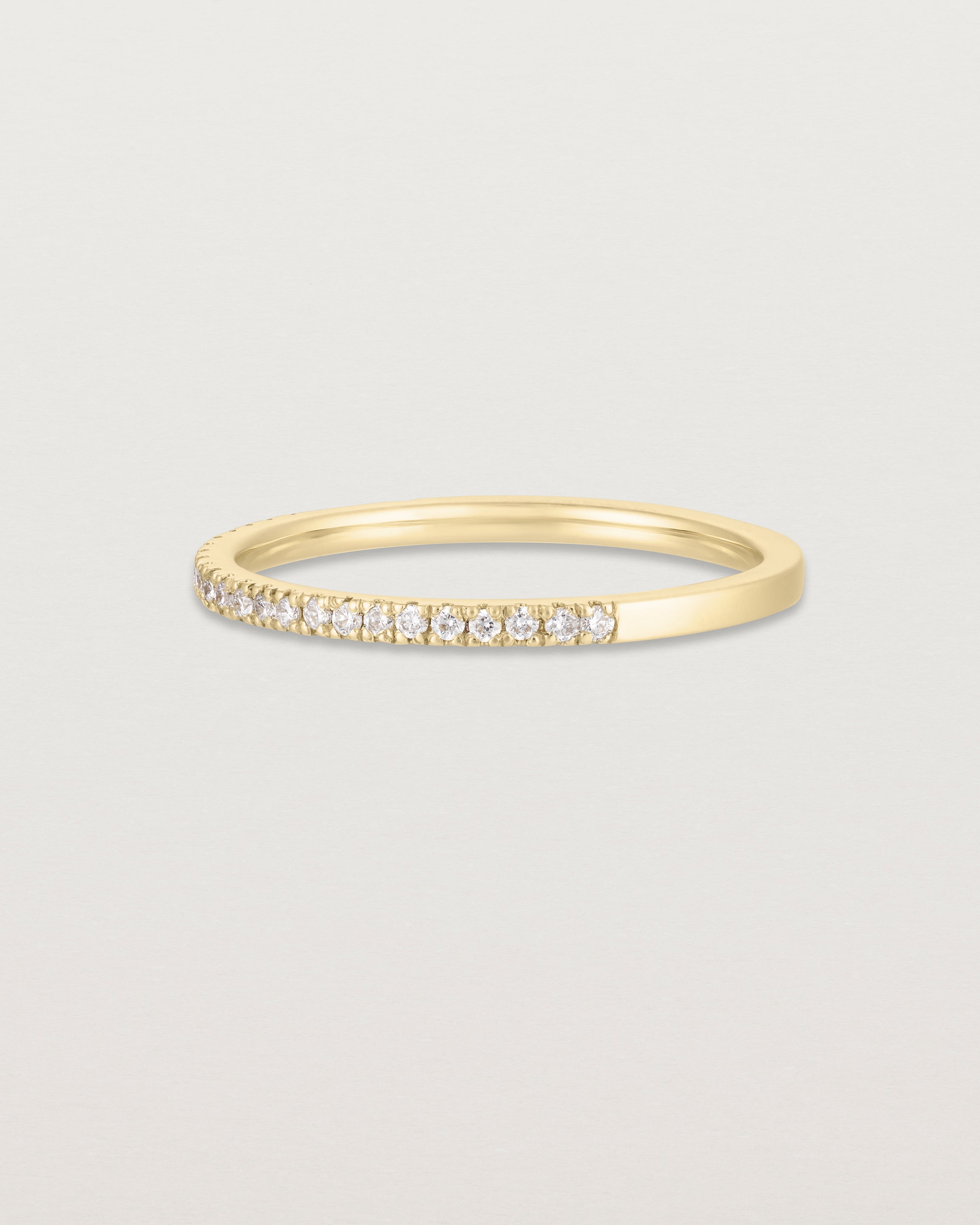 Angled view of the Demi Queenie | White Diamonds in yellow gold.