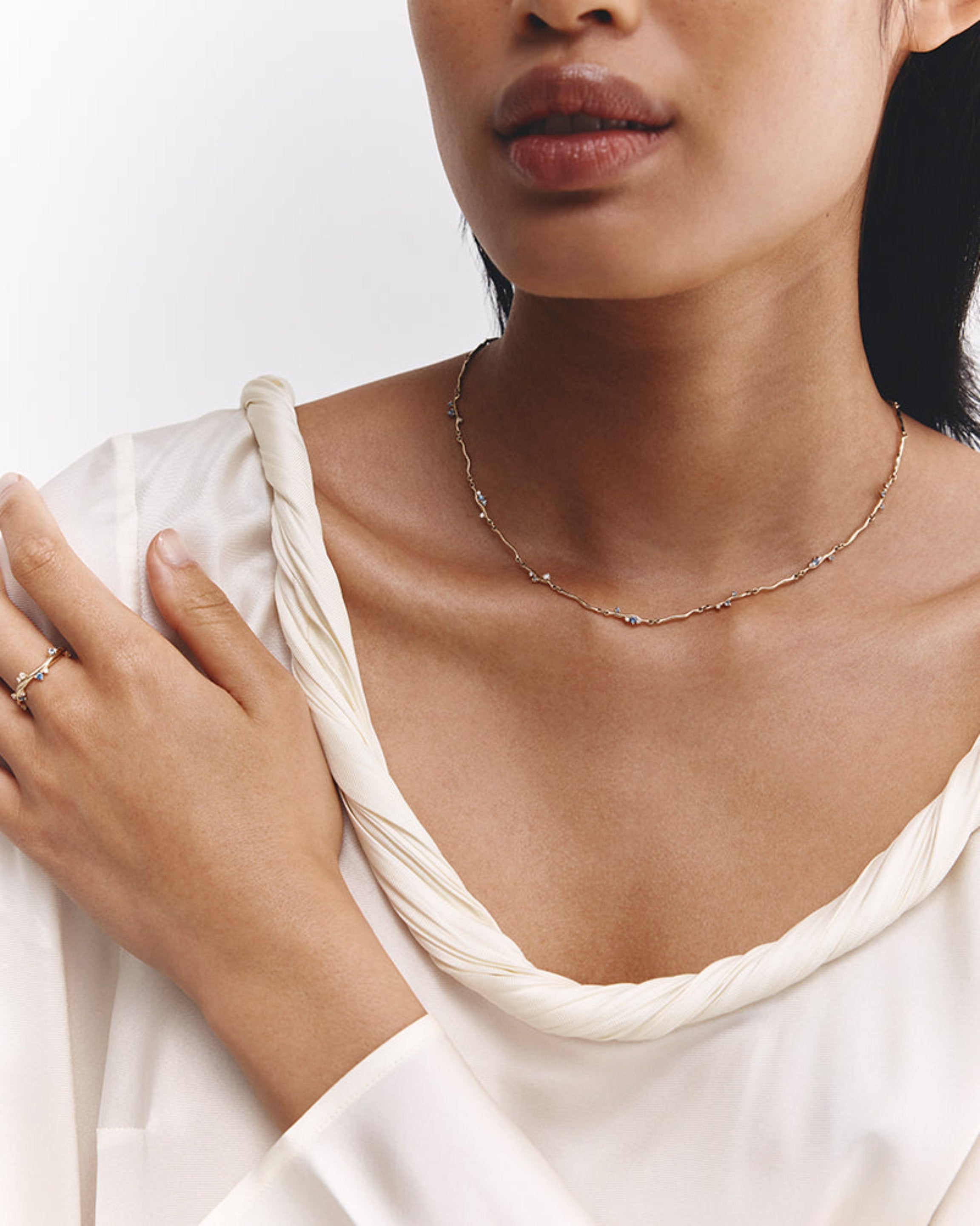 Model wears Demi Ember Necklace 
 with Ceylon Sapphires & Diamonds.