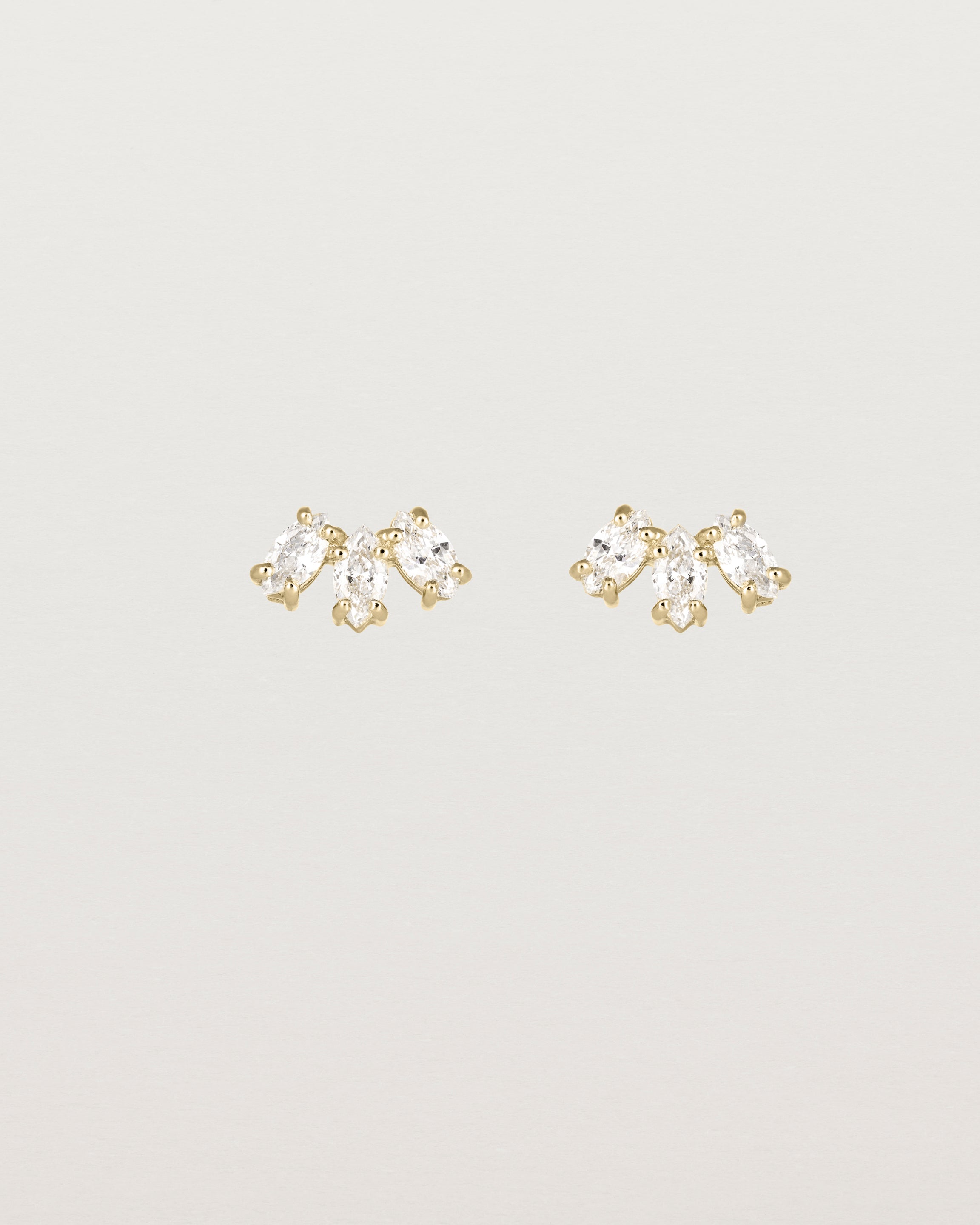 Front view of the Sun Studs | Diamonds in yellow gold.