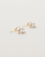 Angled view of the Sun Studs | Diamonds in rose gold.